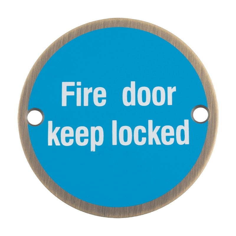 Fire Door Keep Locked Sign - 76mm Diameter - White Text - Drilled & CSK - Antique Brass With Blue Background