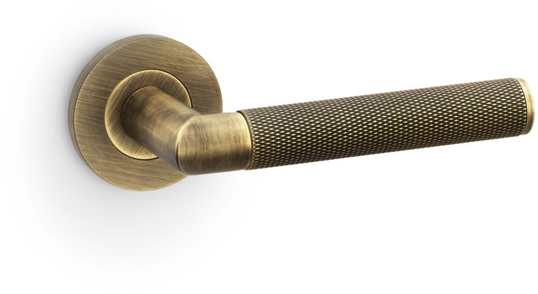 Harrier Knurled Lever Handle On Concealed Fix Low Profile Round Rose - Antique Brass