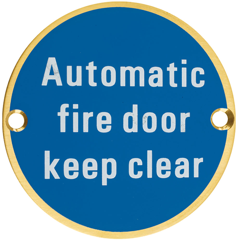Automatic Fire Door Keep Clear - Circular Screw Fix Sign - PVD Satin Brass Edge With Blue Background