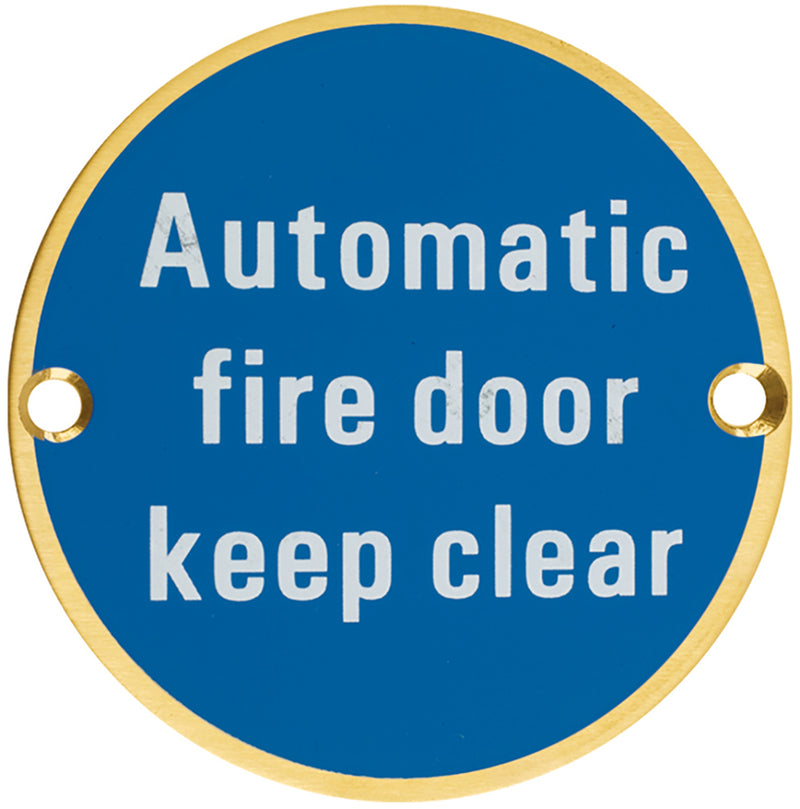 Automatic Fire Door Keep Clear - Circular Screw Fix Sign - PVD Satin Brass Edge With Blue Background