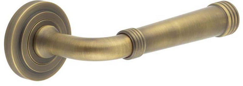 Classic Pattern Lever Handles With Ring Detail With Stepped Round Rose - Suitable For Use With FD30 / FD60 Fire Doors - Antique Brass