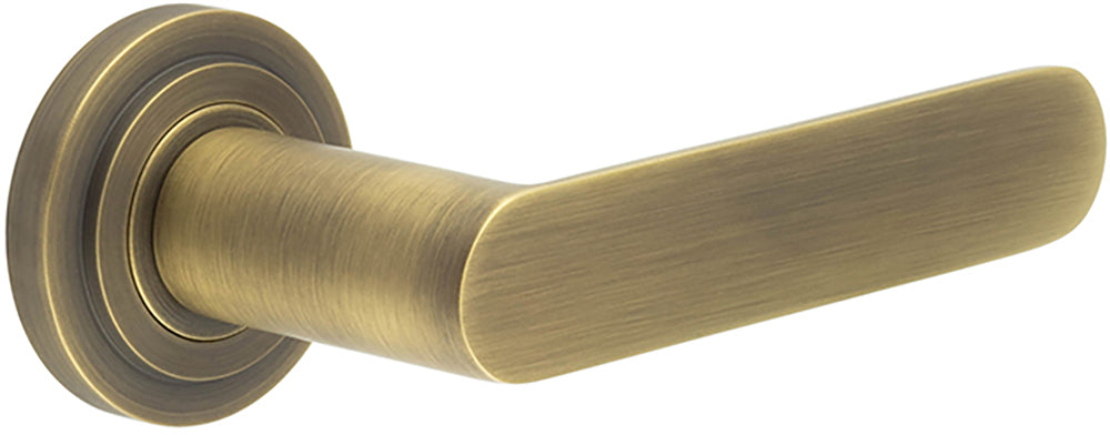 Flat Front Pattern Lever Handles With Stepped Round Rose - Suitable For Use With FD30 / FD60 Fire Doors - Antique Brass
