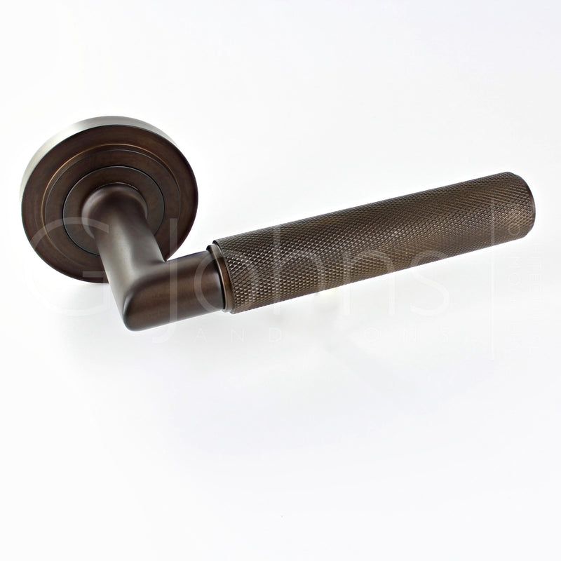 knurled-pattern-lever-handles-with-stepped-round-rose-dark-bronze