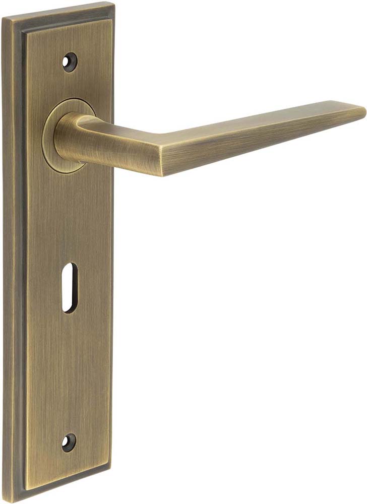 Wedge Pattern Lever Handle On A Large Rectangular Backplate - Antique Brass