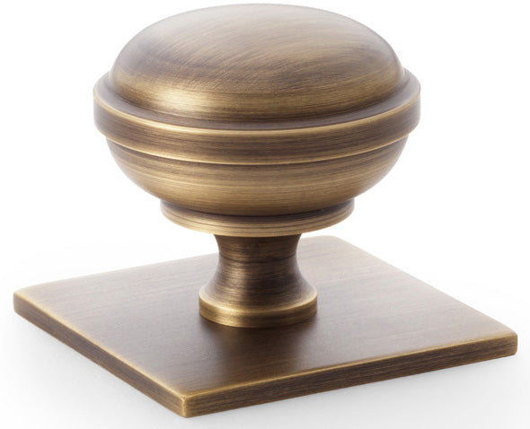 Quantock Cupboard Knob on Square Backplate - Available In Two Sizes - Antique Brass (Lacquered)