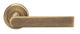 Edge Lever Handle On Concealed Fix Round Rose - Antique Brass (Lacquered) - Suitable For Use With FD30 / FD60 Fire Doors
