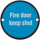 Fire Door Keep Shut Sign - 76mm Diameter - White Text - Drilled & CSK - Matt Black With Blue Background