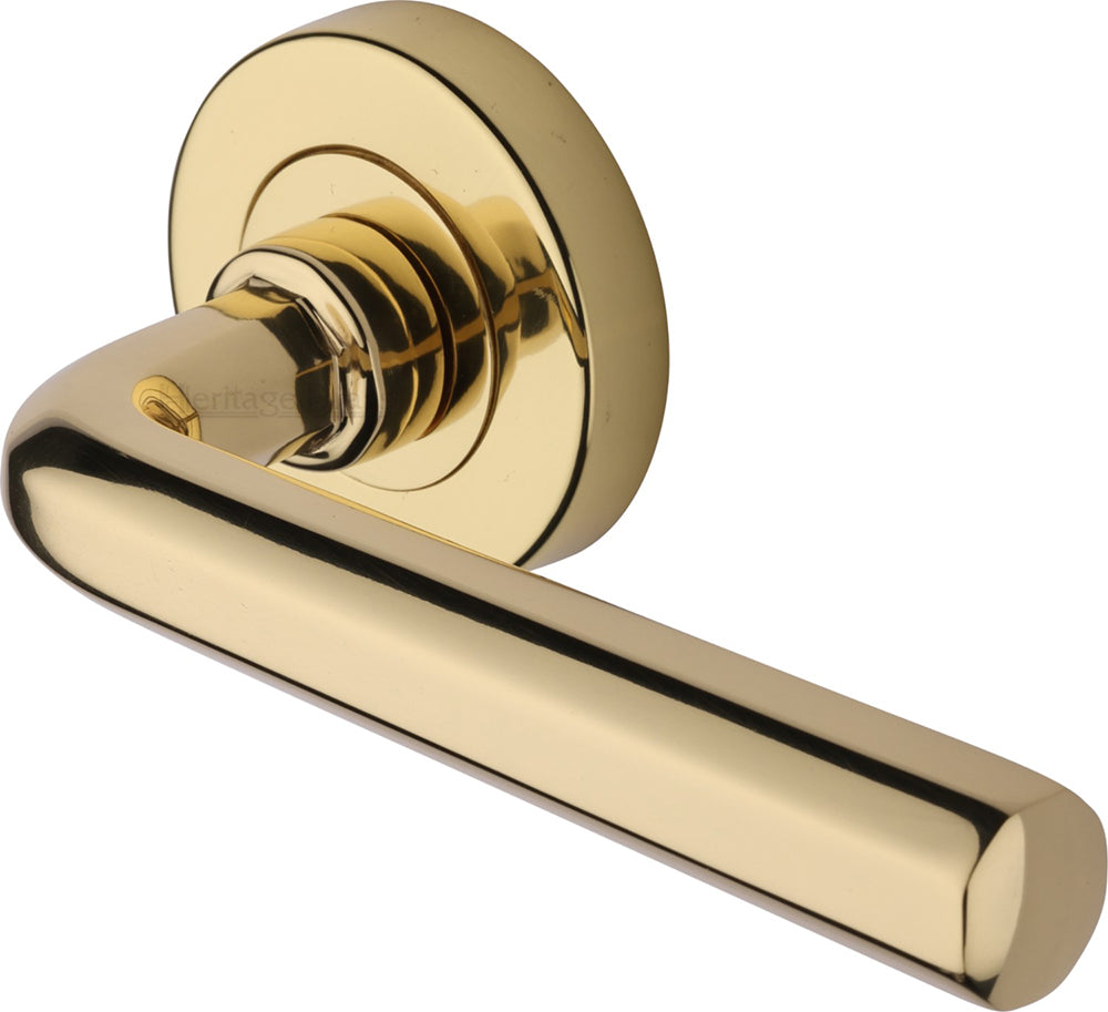 Octave Lever Handle On Round Rose - Polished Brass