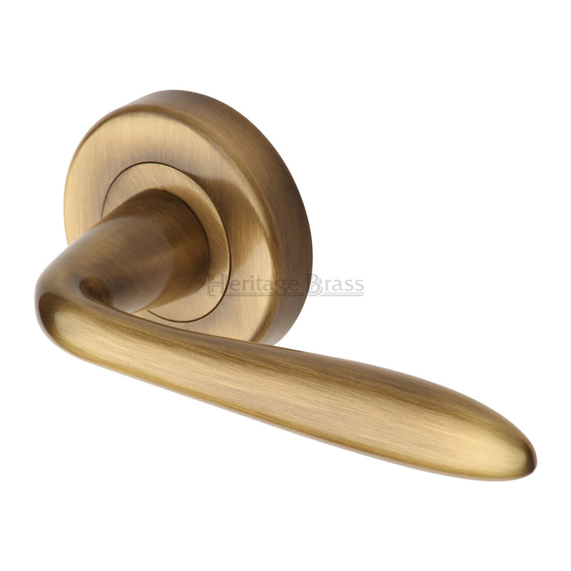 Sutton Round Rose Lever Handles - Antique Brass 
