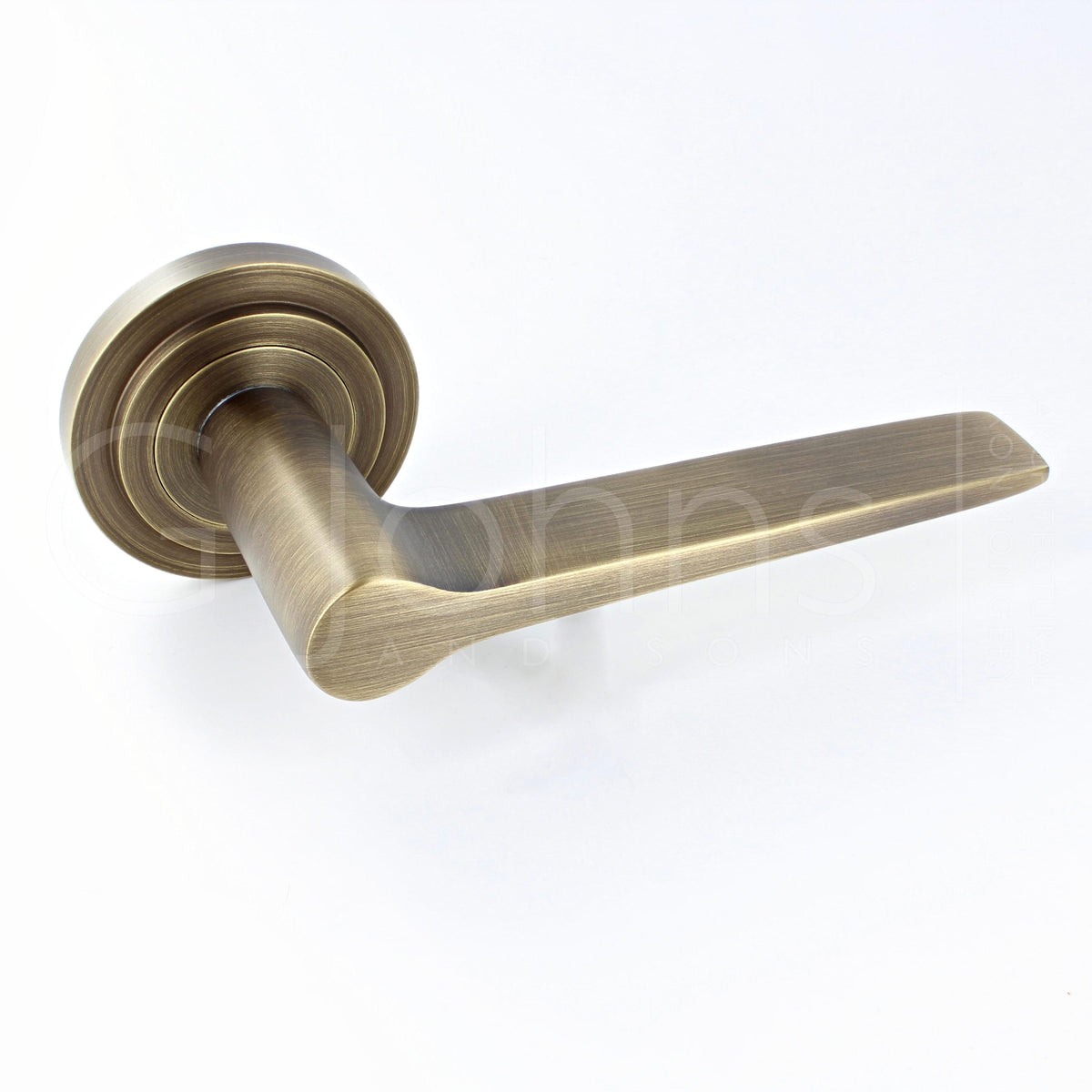tapered-pattern-lever-handles-with-stepped-round-rose-antique-brass