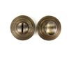 bathroom-oval-knob-turn-release-with-stepped-round-rose-53mm-x-10mm-antique-brass-pair