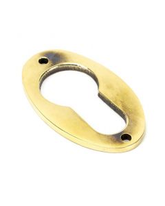 Period Euro Profile Oval Escutcheon - Face Fixed - Aged Brass Unlacquered